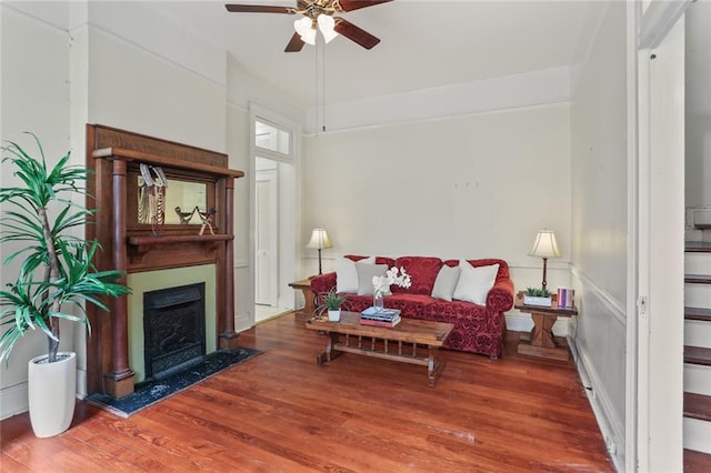 1203 Constantinople St Unit 1, New Orleans, LA 70115 - living room featuring ceiling fan, a fireplace, and wood finished floors