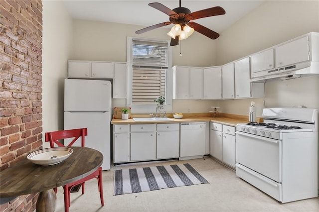 1203 Constantinople St Unit 1, New Orleans, LA 70115 - kitchen featuring white appliances, a ceiling fan, under cabinet range hood, white cabinets, and light countertops