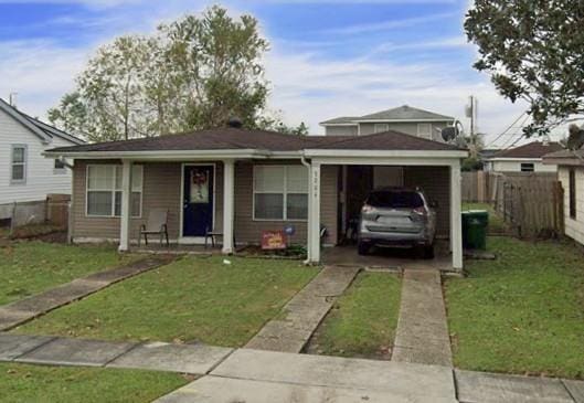 3204 Claire Ave, Gretna, LA 70053 - view of front facade featuring concrete driveway and a garage