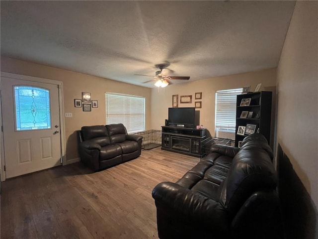 3204 Claire Ave, Gretna, LA 70053 - living room featuring a ceiling fan, wood finished floors, and a textured ceiling