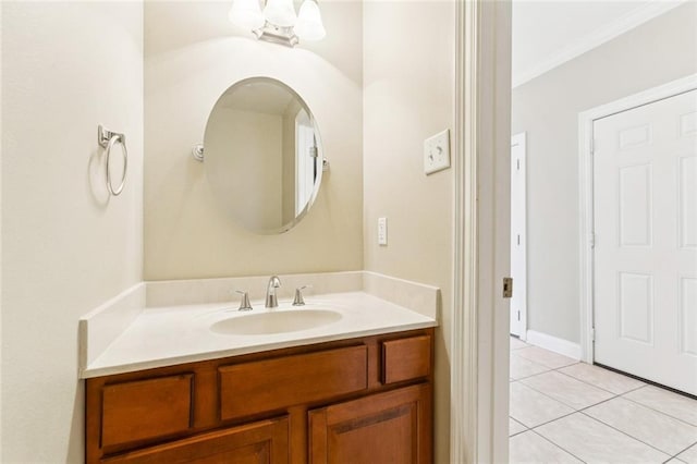 4339 Anthony St, Metairie, LA 70001 - bathroom featuring vanity, tile patterned floors, and crown molding