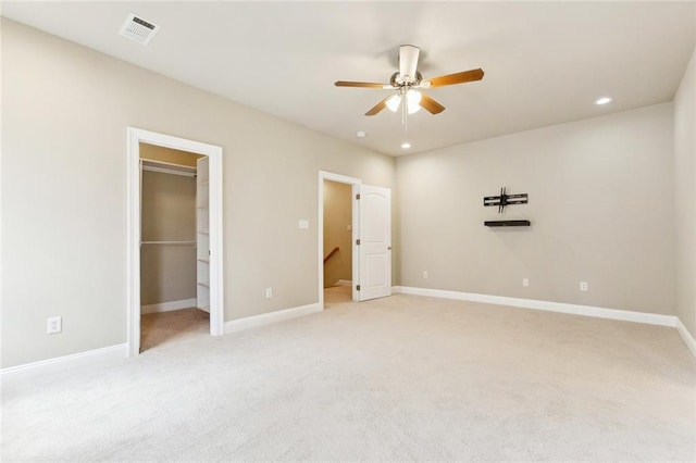 4339 Anthony St, Metairie, LA 70001 - unfurnished bedroom featuring light carpet, a spacious closet, recessed lighting, and a ceiling fan