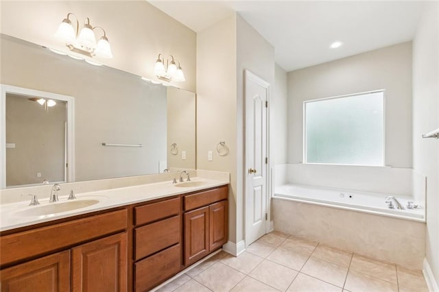 4339 Anthony St, Metairie, LA 70001 - full bathroom with double vanity, a bath, and tile patterned floors