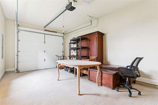 4339 Anthony St, Metairie, LA 70001 - garage featuring a garage door opener and baseboards