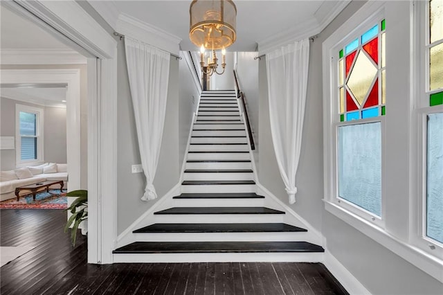 5349 Prytania St, New Orleans, LA 70115 - staircase with hardwood / wood-style floors, a chandelier, healthy amount of natural light, and crown molding