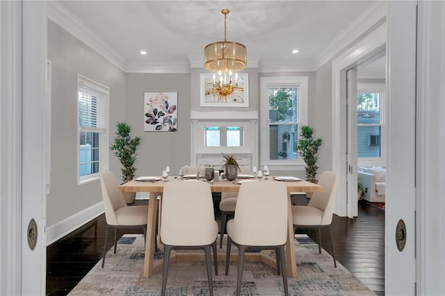 5349 Prytania St, New Orleans, LA 70115 - dining area featuring wood finished floors, a chandelier, healthy amount of natural light, crown molding, and recessed lighting