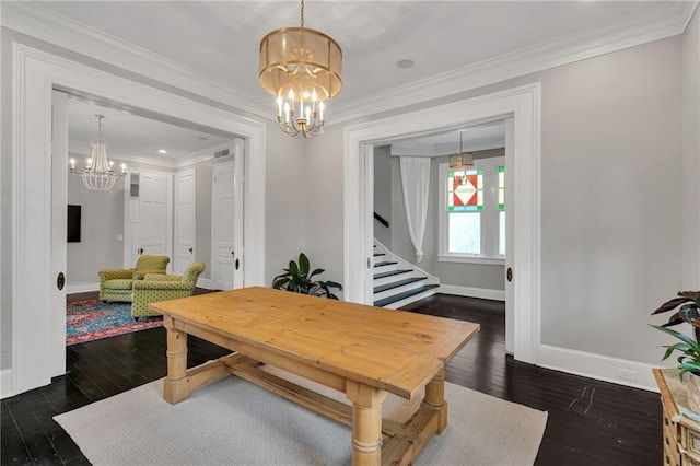 5349 Prytania St, New Orleans, LA 70115 - dining area featuring a chandelier, stairway, dark wood-style floors, and ornamental molding