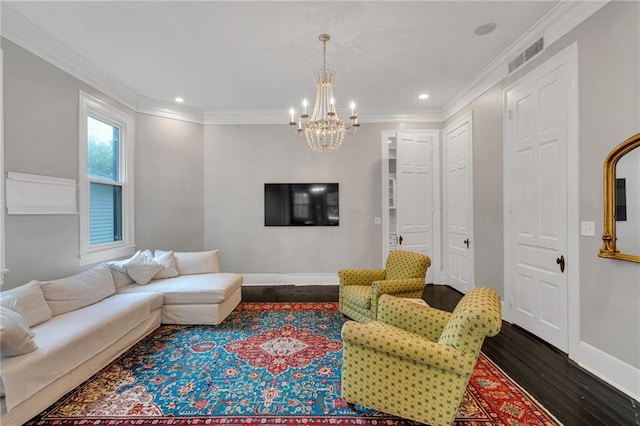 5349 Prytania St, New Orleans, LA 70115 - living area with dark wood-type flooring, a chandelier, ornamental molding, and recessed lighting