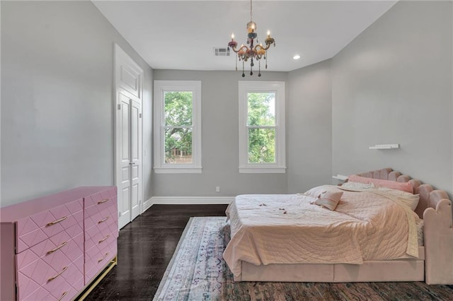 5349 Prytania St, New Orleans, LA 70115 - bedroom featuring a chandelier, dark wood-type flooring, and recessed lighting