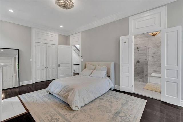 5349 Prytania St, New Orleans, LA 70115 - bedroom with recessed lighting, dark wood-style flooring, ornamental molding, a closet, and ensuite bathroom