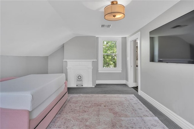 5349 Prytania St, New Orleans, LA 70115 - bedroom featuring vaulted ceiling and baseboards