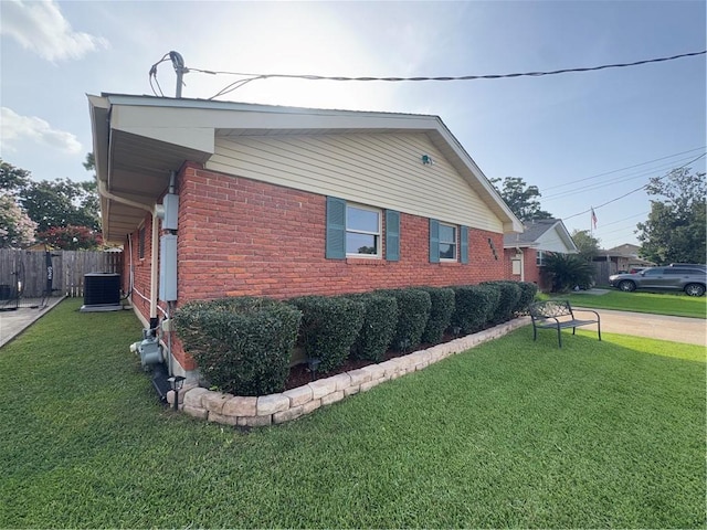 1620 Kent Ave, Metairie, LA 70001 - view of side of property featuring brick siding and a cooling unit