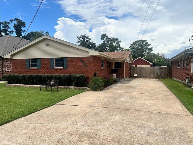 1620 Kent Ave, Metairie, LA 70001 - view of property exterior featuring brick siding and concrete driveway