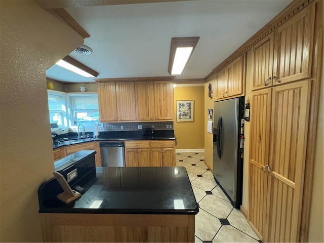1620 Kent Ave, Metairie, LA 70001 - kitchen with dark countertops, refrigerator with ice dispenser, dishwasher, backsplash, and crown molding