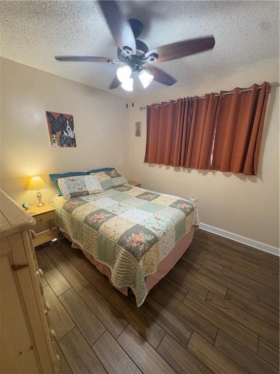 1620 Kent Ave, Metairie, LA 70001 - bedroom with wood finished floors, a textured ceiling, and ceiling fan