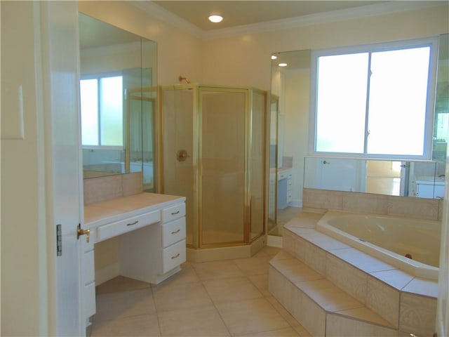 bathroom with tile flooring, shower with separate bathtub, plenty of natural light, and vanity