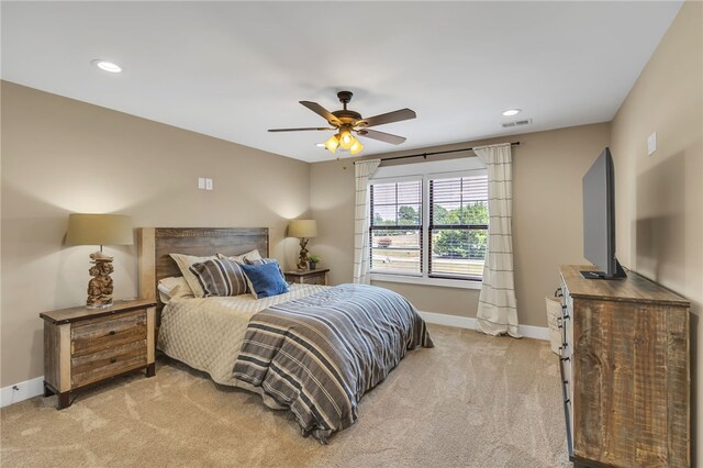 bedroom with light carpet, visible vents, baseboards, ceiling fan, and recessed lighting