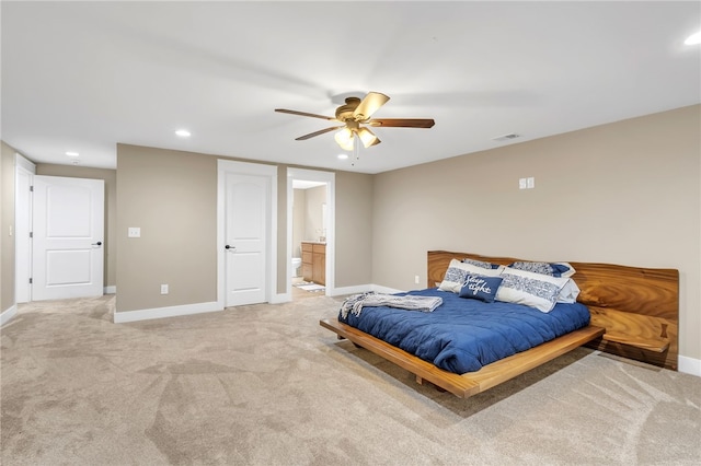 bedroom featuring recessed lighting, visible vents, light carpet, and baseboards