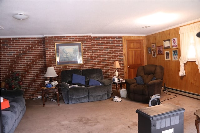 living room featuring ornamental molding, carpet flooring, brick wall, wooden walls, and a baseboard heating unit