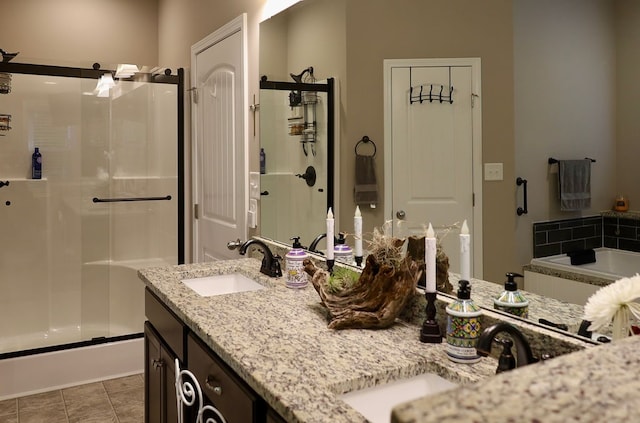 bathroom with vanity, plus walk in shower, and tile patterned flooring