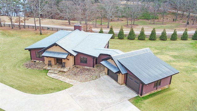 birds eye view of property featuring a rural view