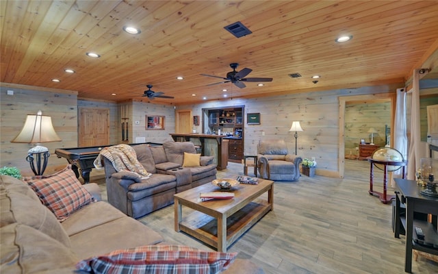 living room featuring wood ceiling, billiards, ceiling fan, light hardwood / wood-style flooring, and wooden walls