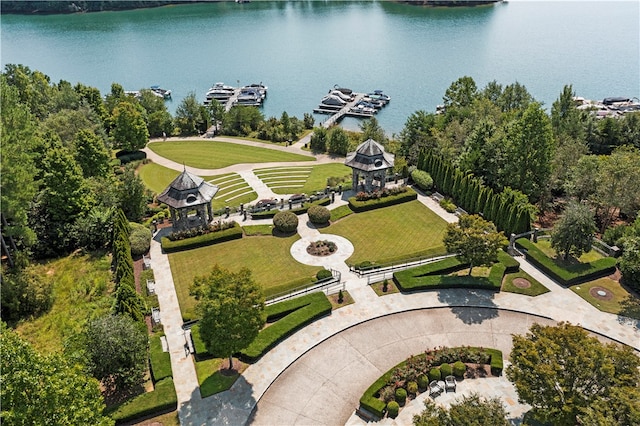 birds eye view of property with a water view