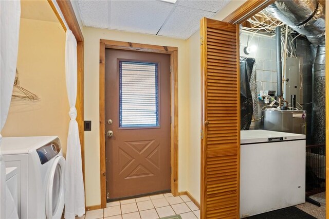 728 Tall Oak Trl, Seneca, SC 29678 - clothes washing area with light tile patterned floors and independent washer and dryer