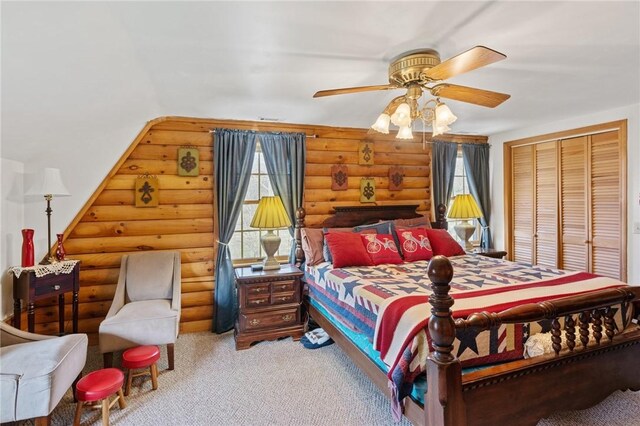 728 Tall Oak Trl, Seneca, SC 29678 - bedroom with ceiling fan, a closet, and rustic walls