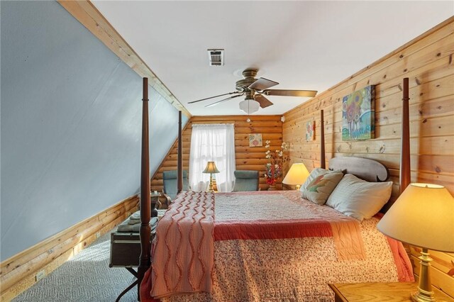728 Tall Oak Trl, Seneca, SC 29678 - bedroom featuring ceiling fan and log walls
