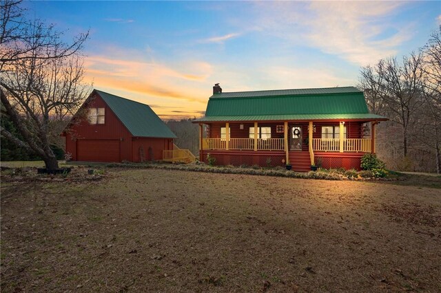 728 Tall Oak Trl, Seneca, SC 29678 - view of front of property with a garage, covered porch, and an outbuilding