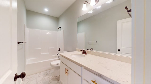 full bathroom with washtub / shower combination, vanity, and toilet