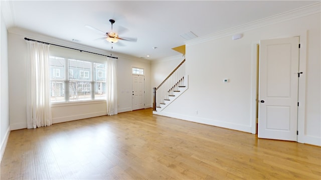 interior space featuring ceiling fan, light hardwood / wood-style flooring, and ornamental molding