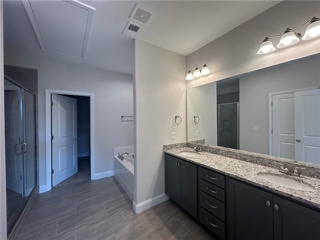 bathroom featuring tile patterned flooring, dual vanity, and independent shower and bath