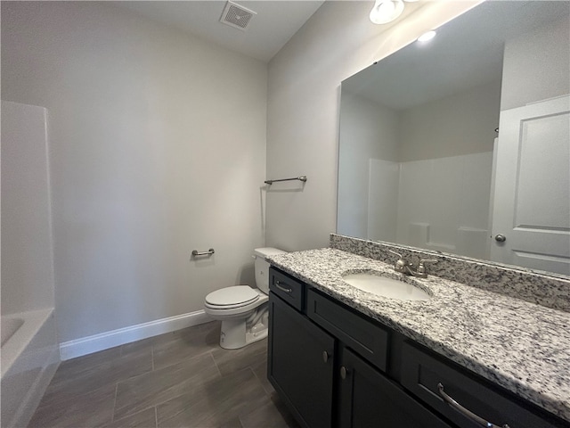 full bathroom with vanity, shower / bathing tub combination, and toilet