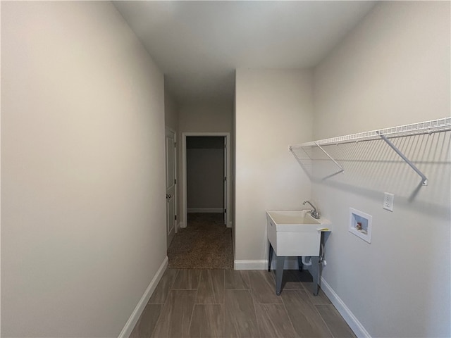 laundry area featuring carpet and washer hookup