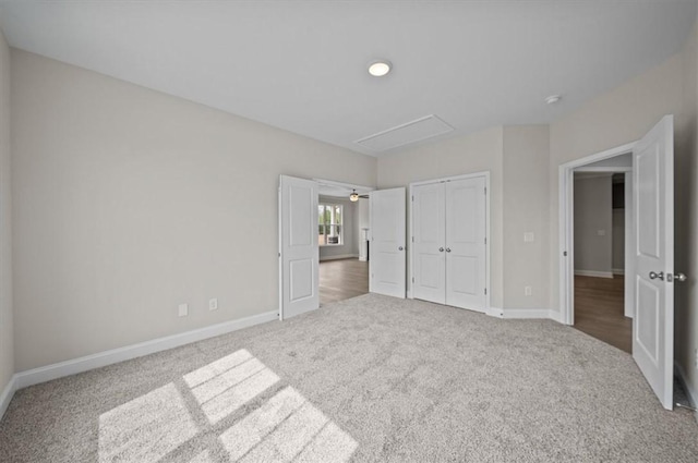 170 Preston Ridge Dr, Seneca, SC 29672 - unfurnished bedroom featuring attic access, carpet floors, baseboards, and a closet
