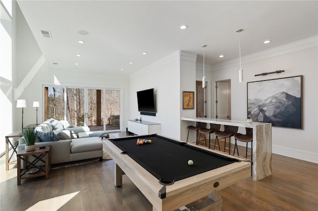 rec room with ornamental molding, dark wood-type flooring, and pool table