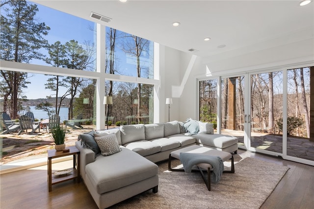 sunroom with a water view