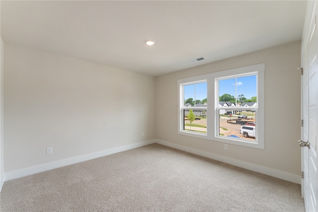 view of carpeted spare room