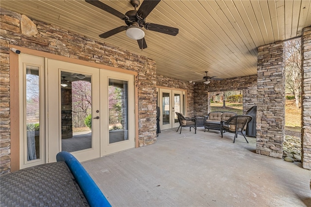 view of patio / terrace with ceiling fan, outdoor lounge area, and french doors