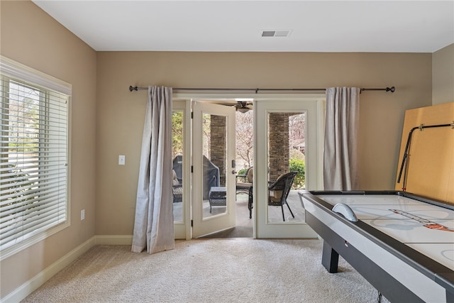 playroom with carpet flooring and ceiling fan