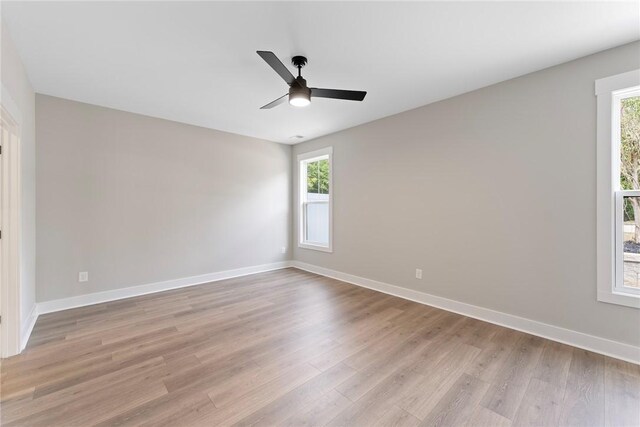 305 Breakwater Ln, Seneca, SC 29678 - empty room with baseboards, wood finished floors, and ceiling fan