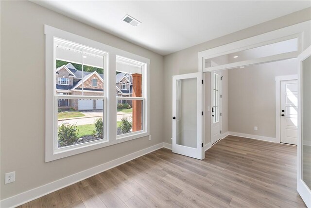 305 Breakwater Ln, Seneca, SC 29678 - foyer entrance with light wood finished floors, baseboards, and visible vents
