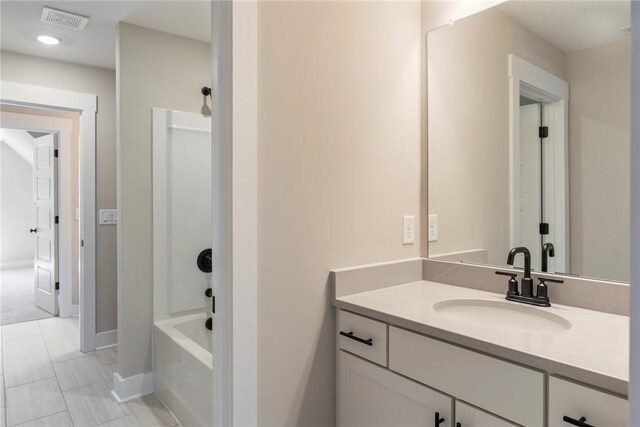 305 Breakwater Ln, Seneca, SC 29678 - bathroom with baseboards, visible vents, vanity, and shower / bathtub combination