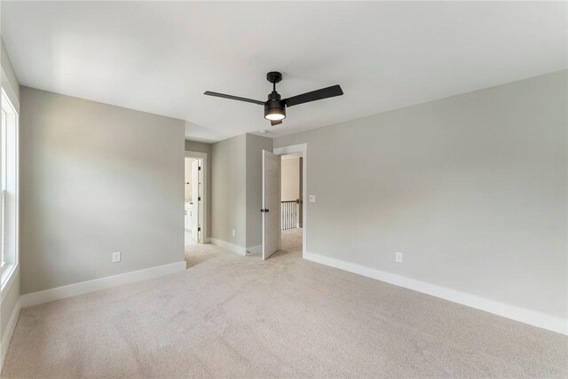 305 Breakwater Ln, Seneca, SC 29678 - unfurnished room with a ceiling fan, light carpet, and baseboards