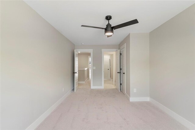 305 Breakwater Ln, Seneca, SC 29678 - spare room featuring baseboards, ceiling fan, and light colored carpet