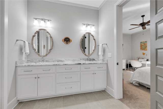 bathroom featuring crown molding, tile patterned flooring, vanity, and ceiling fan