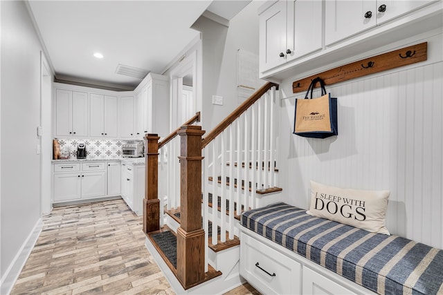 mudroom with light wood-type flooring