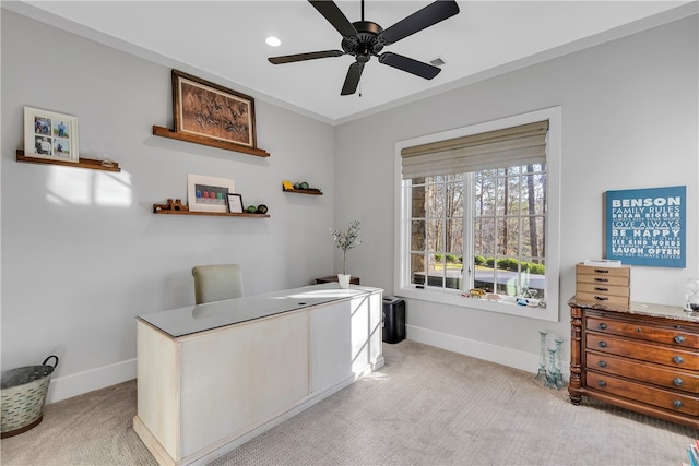 office space with ceiling fan and light carpet